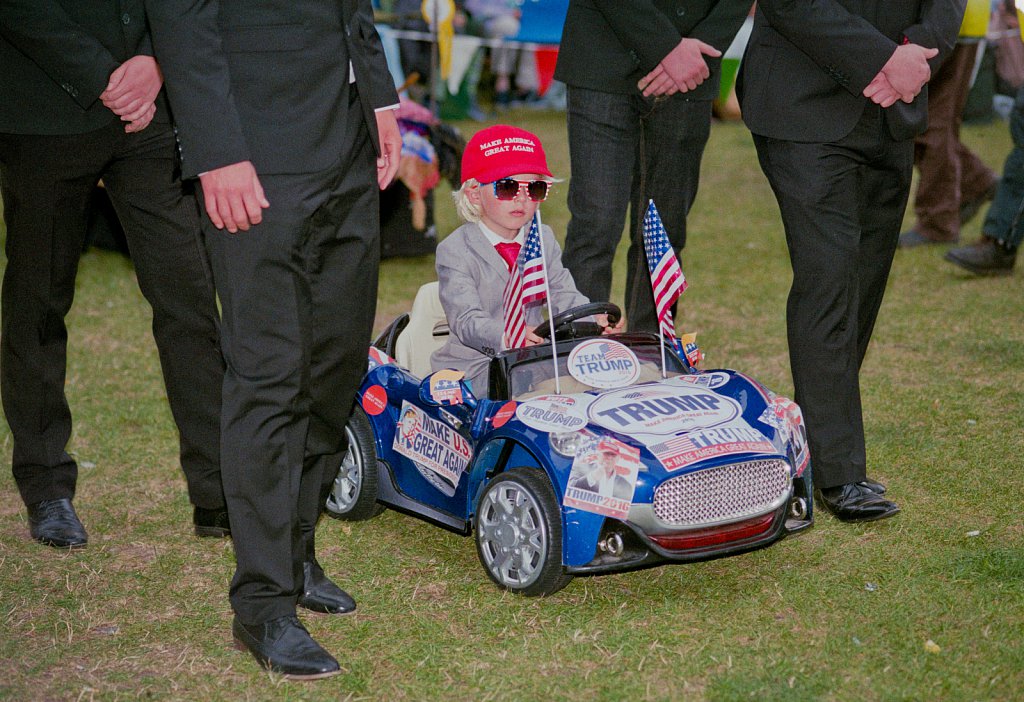 Donald Trump and entourage of bodyguards entry for the Wells Next The Sea carnival in Norfolk, August 2017.